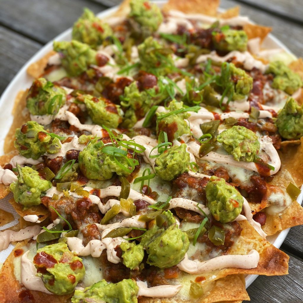 Level up Nachos with Chipotle creme and Guacamole