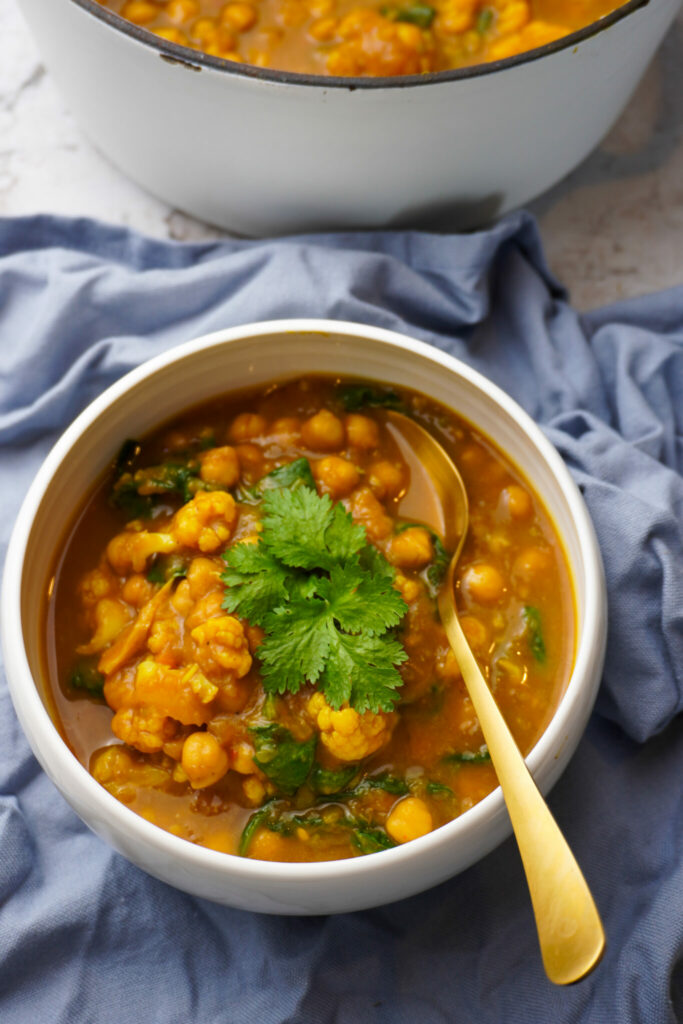 Utilising part of a whole roast pumpkin and canned chickpeas for a nourishing plant based curry with an incredible gravy