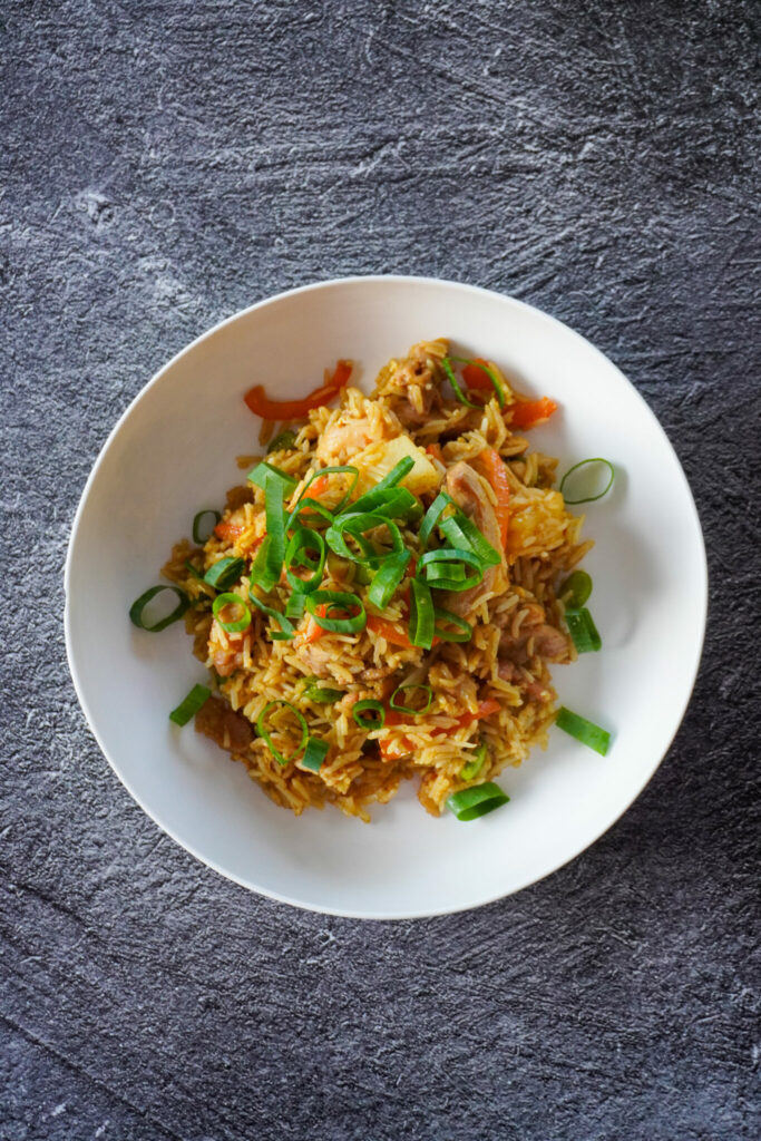 A delicious variation of fried rice with sweet pineapple and stir fried vegetables